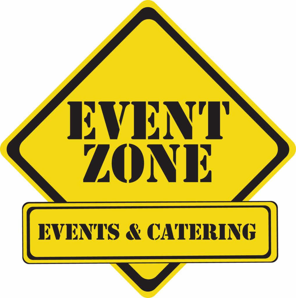 Żółty znak ostrzegawczy w kształcie rombu z napisem EVENT ZONE, poniżej prostokątna tabliczka z napisem EVENTS & CATERING, czarne litery na żółtym tle.