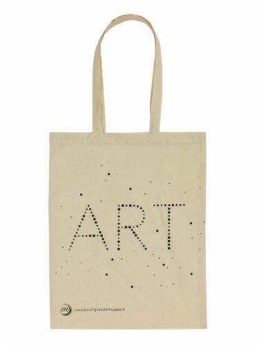 Beżowa torba bawełniana z napisem 'ART' utworzonym z kropek i logiem 'boutiquedemusees.fr' w lewym dolnym rogu.