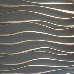 Usługi Remontowo-Budowlane Mateusz Pacuła - Tekstura ściany z falistymi, trójwymiarowymi panelami w odcieniach szarości z delikatnym połyskiem, tworzącymi efekt głębi i ruchu.