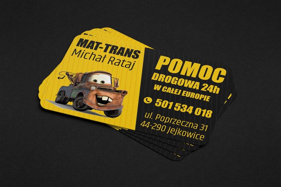 Wizytówki firmy MAT-TRANS Michała Rataja oferującej pomoc drogową 24h w całej Europie, z ilustracją Złomka z filmu Auta.