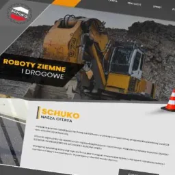 Prezentacja strony internetowej firmy budowlanej z koparką w tle i hasłem 'Roboty ziemne i drogowe', dwa pachołki drogowe na pierwszym planie.