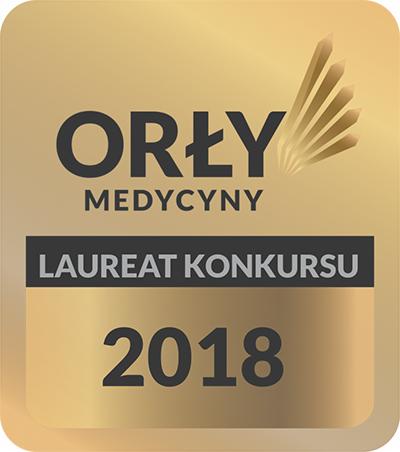 Złota plakietka z napisem 'Orły Medycyny', pod spodem 'Laureat Konkursu' i rok '2018'.