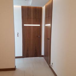 Hoton Design Robert Urbański - drzwi fornirowane w orzechu , realizacja Hoton