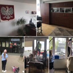 Vitomad - Zespół sprzątający myje okna w biurze, widoczne osoby w trakcie pracy, biurko z dokumentami, budynek z napisem 'HIPOKRATES' w tle.