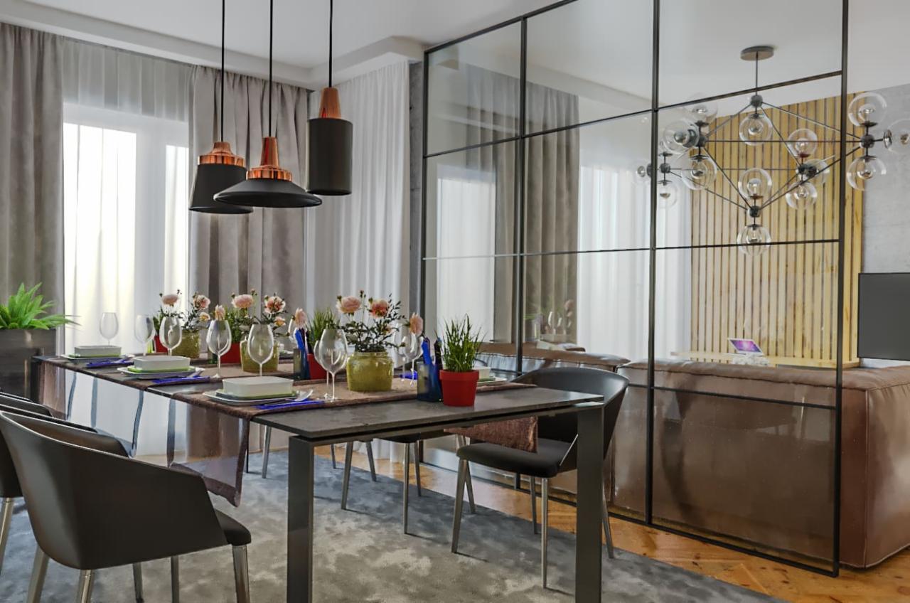 Jadalnia z szarym dywanem, stołem z kamiennym blatem, czarnymi krzesłami i szklaną ścianą działową z czarnymi szprosami, widok na salon z drewnianą ścianą i nowoczesnym żyrandolem.
