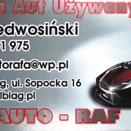 Wizytówka firmy Auto-Raf z Elbląga oferującej samochody używane, z danymi kontaktowymi i grafiką sportowego auta.