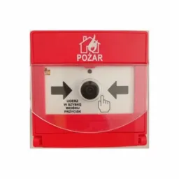 Czerwony, natynkowy ręczny ostrzegacz pożarowy z przezroczystą osłoną i symbolem płomieni w domku. Na białej tabliczce czarne strzałki wskazują na centralny przycisk z napisem 'uderz w szybkę...