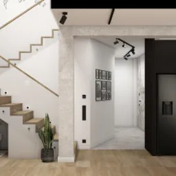 Nowoczesne wnętrze domu z drewnianymi schodami z podświetleniem LED, szklaną balustradą, kącikiem zabaw dla dzieci pod schodami oraz czarną zabudową kuchenną z lodówką Samsung Family Hub.