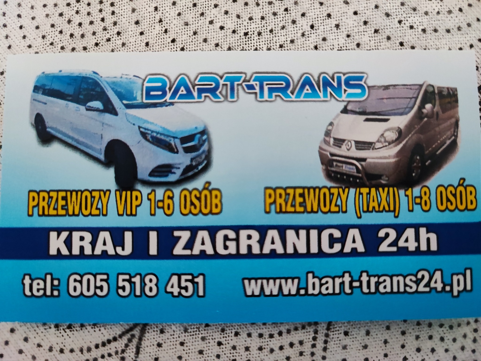 Wizytówka firmy Bart-Trans z dwoma samochodami: biały van VIP i srebrny bus taxi, oferująca przewozy krajowe i zagraniczne 24h, z numerem telefonu i adresem strony internetowej.