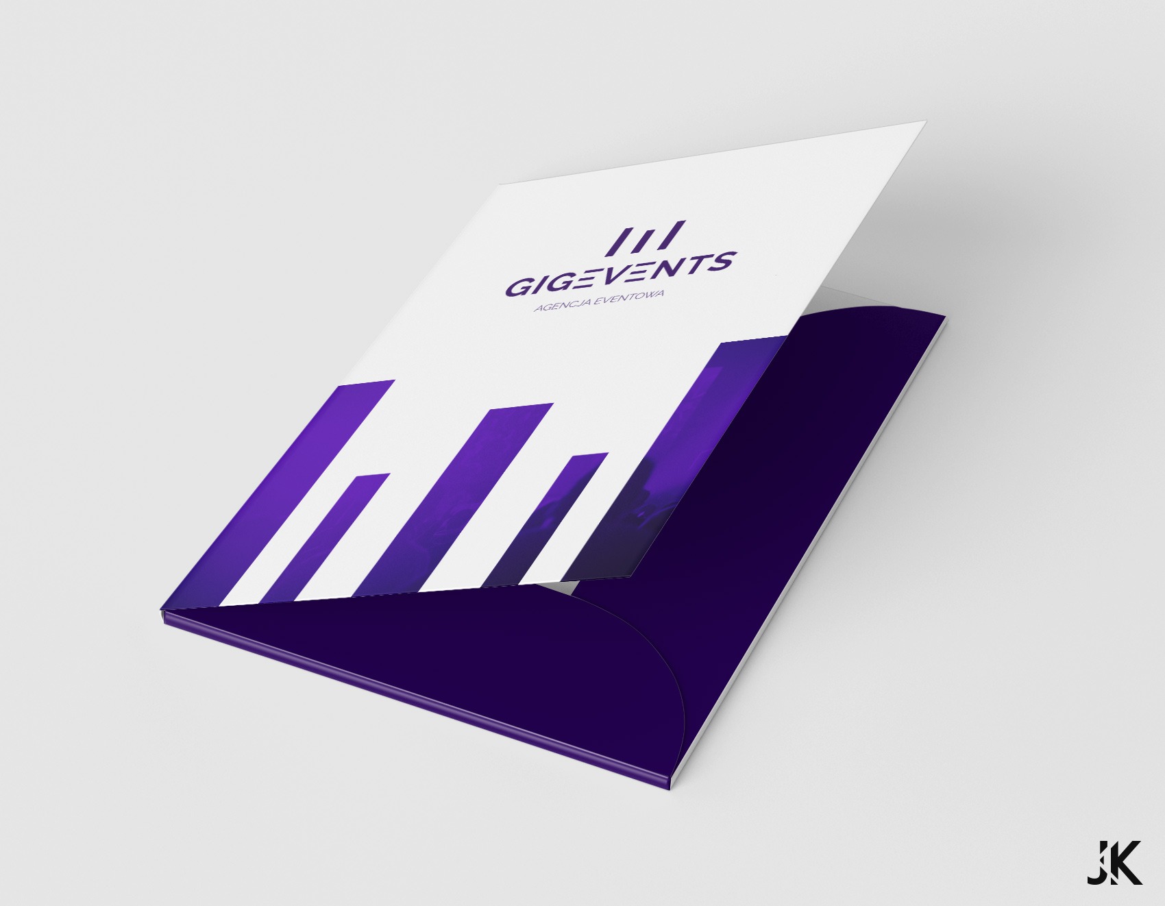 Otwarty folder firmowy z logo 'GIGEVENTS Agencja Eventowa' w kolorze fioletowym, leżący na białym tle.