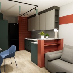 FOXX DESIGN SPÓŁKA Z OGRANICZONĄ ODPOWIEDZIALNOŚCIĄ - Wizualizacja małej kuchni z jadalnią i salonem w nowoczesnym stylu. Ciemne meble kuchenne, ceglana ściana, szara sofa i niebieskie krzesła tworzą spójną całość.