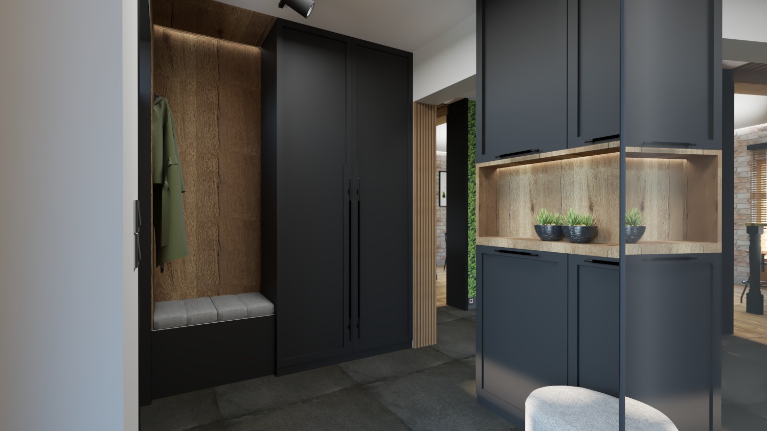 Nowoczesny przedpokój z czarnymi szafami, drewnianymi akcentami i oświetleniem LED, uzupełniony roślinami doniczkowymi i szarą pufą.