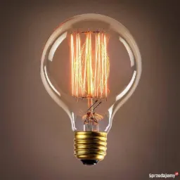 Żarówka Edisona z żarnikiem w kształcie klatki w ciepłym odcieniu, na brązowym tle.