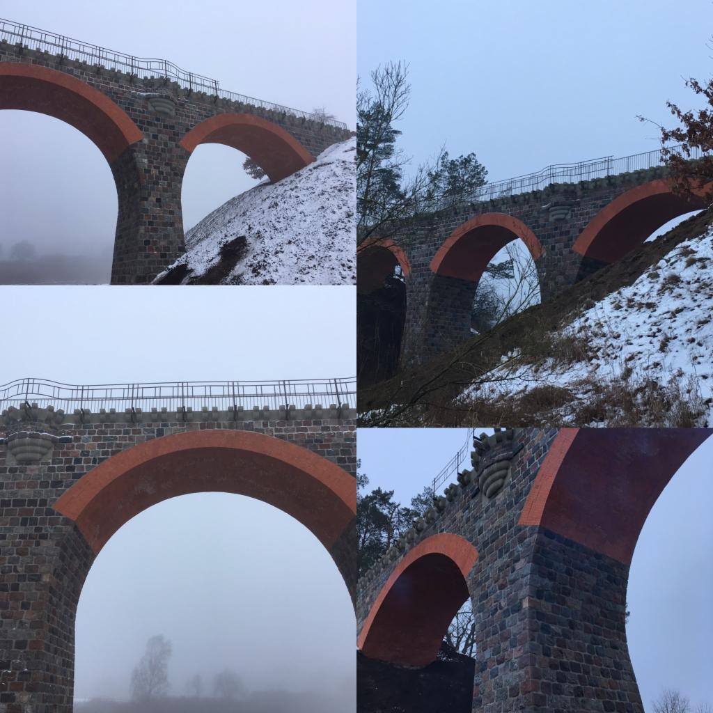 Cztery ujęcia kamiennego wiaduktu z ceglanymi łukami w zimowej scenerii, częściowo spowitego mgłą.