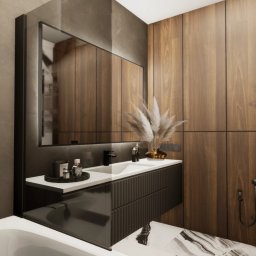 AUMÜLLERDESIGN Pracownia Rozwoju Przestrzeni - Nowoczesna łazienka z drewnianą ścianą, czarną armaturą i podświetlanym lustrem. Umywalka z dekoracjami i marmurowa podłoga.