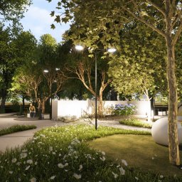 AUMÜLLERDESIGN Pracownia Rozwoju Przestrzeni - Projekt zagospodarowania terenu zielonego z oświetleniem, ścieżkami i miejscami do siedzenia, otoczonego drzewami i roślinami. Widoczne osoby korzystające z przestrzeni.