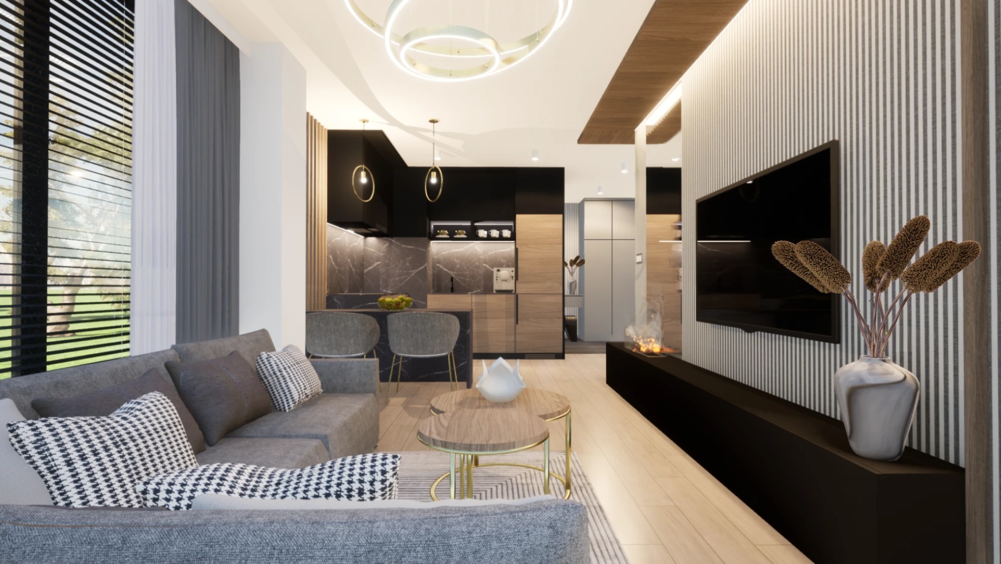 Nowoczesne wnętrze mieszkania z szarą sofą, drewnianymi stolikami, telewizorem na ścianie w paski i otwartą kuchnią z marmurowym blatem. Widok na zieleń za oknem.