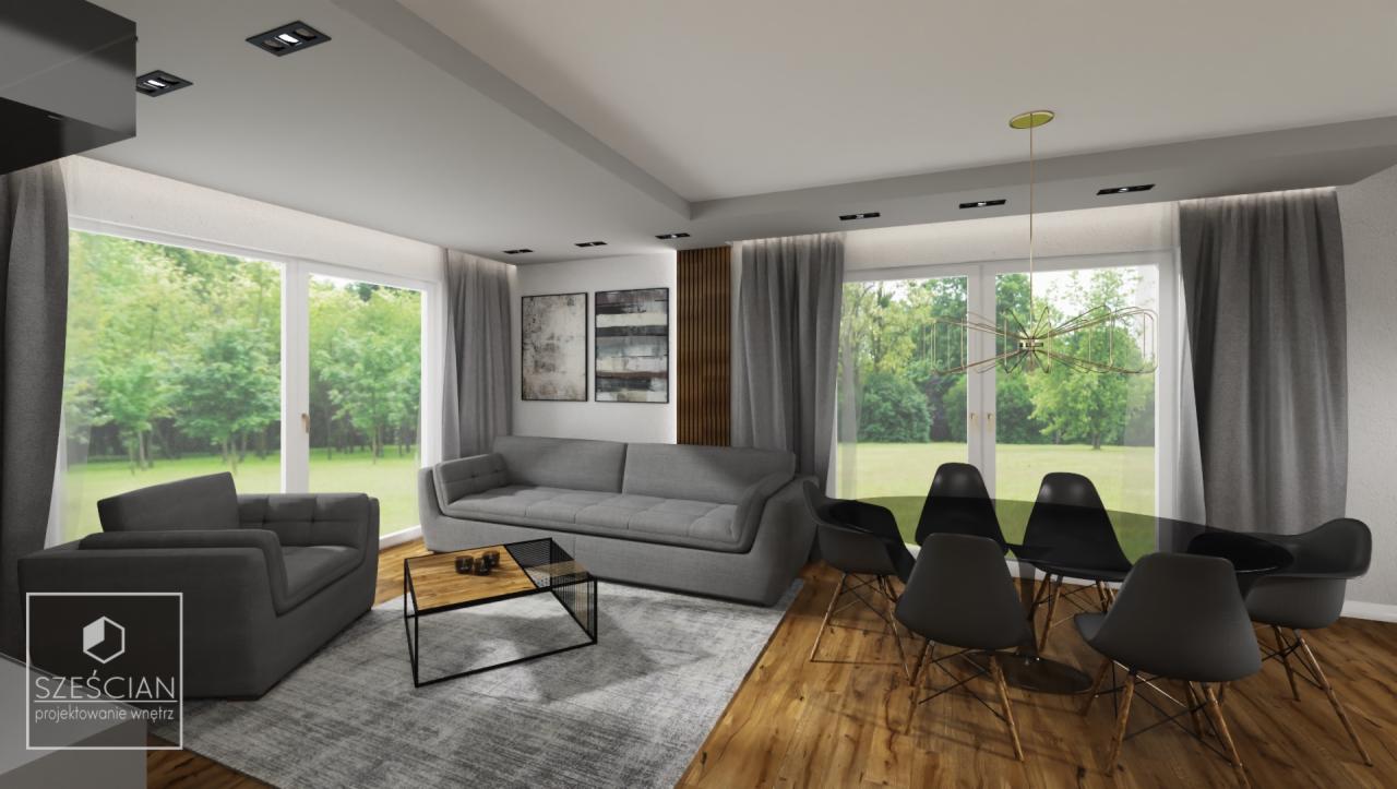 Wizualizacja przestronnego salonu z szarą sofą, fotelem, stolikiem kawowym i stołem z krzesłami, duże okna z widokiem na zieleń, drewniana podłoga i nowoczesna lampa wisząca.