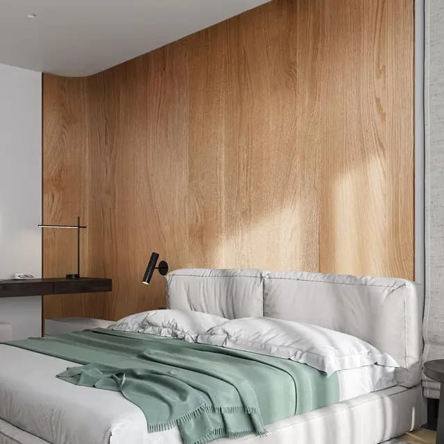 Drewniana ściana w sypialni z łóżkiem w stylu skandynawskim. Naturalne wykończenie drewna, minimalistyczne oświetlenie boczne i stonowana kolorystyka wnętrza.