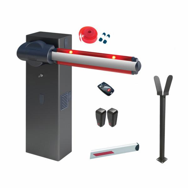Zestaw do montażu automatycznej zapory drogowej: szara obudowa z ramieniem z czerwonymi lampkami, pilot, fotokomórki, słupek podporowy i akcesoria na białym tle.