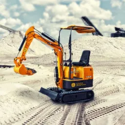 Żółta minikoparka Günter Grossmann CG800 na piaszczystym terenie w Skoczowie, z widocznymi śladami gąsienic i hałdą piasku w tle.