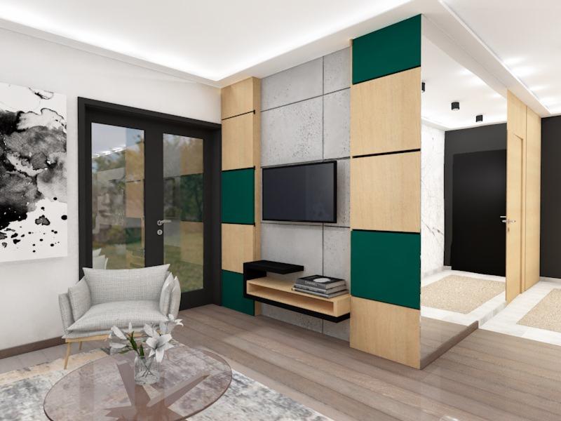 Wizualizacja salonu z panelem TV z betonu architektonicznego i drewnianymi elementami w kolorze butelkowej zieleni, szklany stolik kawowy z kwiatami, szary fotel i czarne drzwi balkonowe.