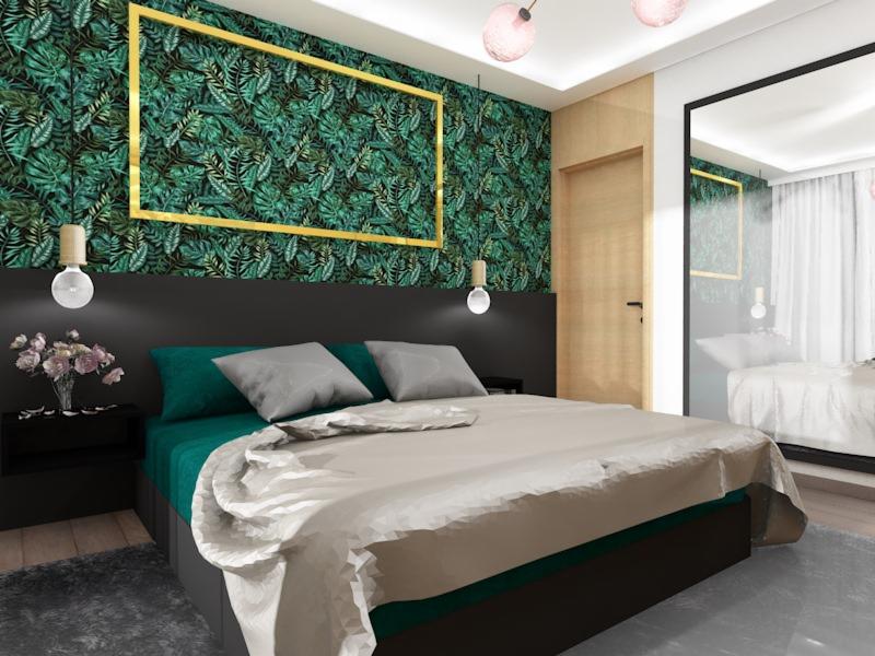 Nowoczesna sypialnia z łóżkiem kontynentalnym, zieloną pościelą i tapetą w motywy roślinne, zaakcentowana złotą ramą na ścianie oraz minimalistycznymi lampkami nocnymi.