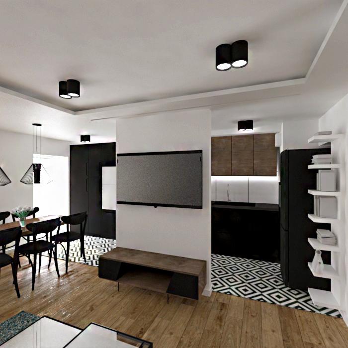 Wnętrze mieszkania w stylu nowoczesnym z otwartą kuchnią, drewnianą podłogą i czarno-białą mozaiką na podłodze w kuchni, widoczne czarne krzesła przy stole jadalnianym i wiszące lampy.