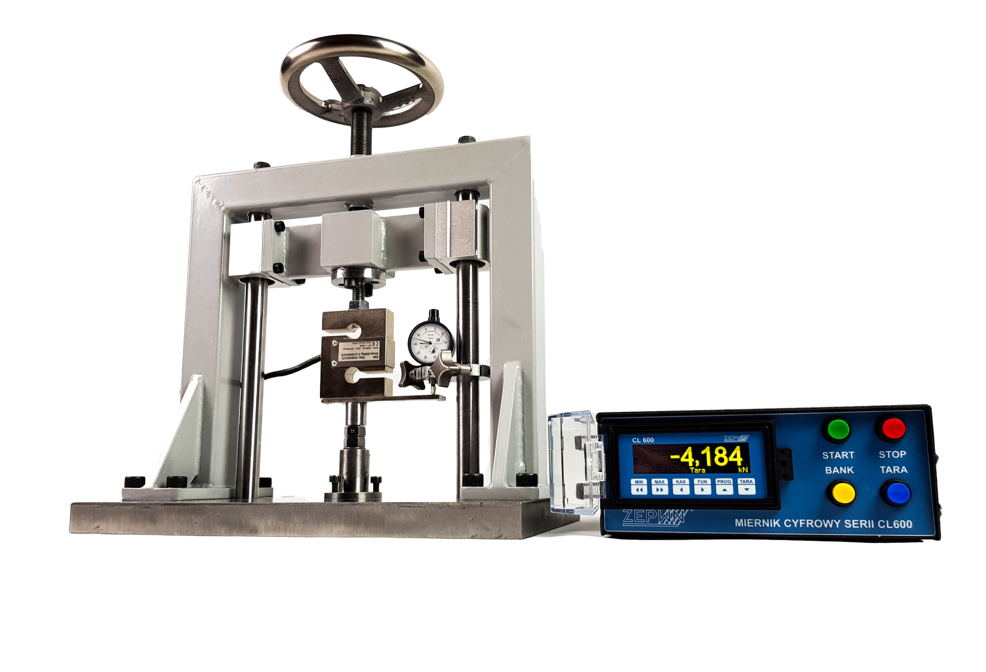 Urządzenie do pomiaru sprężyn z miernikiem cyfrowym serii CL600, pokazującym wartość -4.184 kN. Widoczny mechanizm śrubowy z kołem ręcznym, czujnik siły oraz wskaźnik zegarowy. Całość umieszczona...
