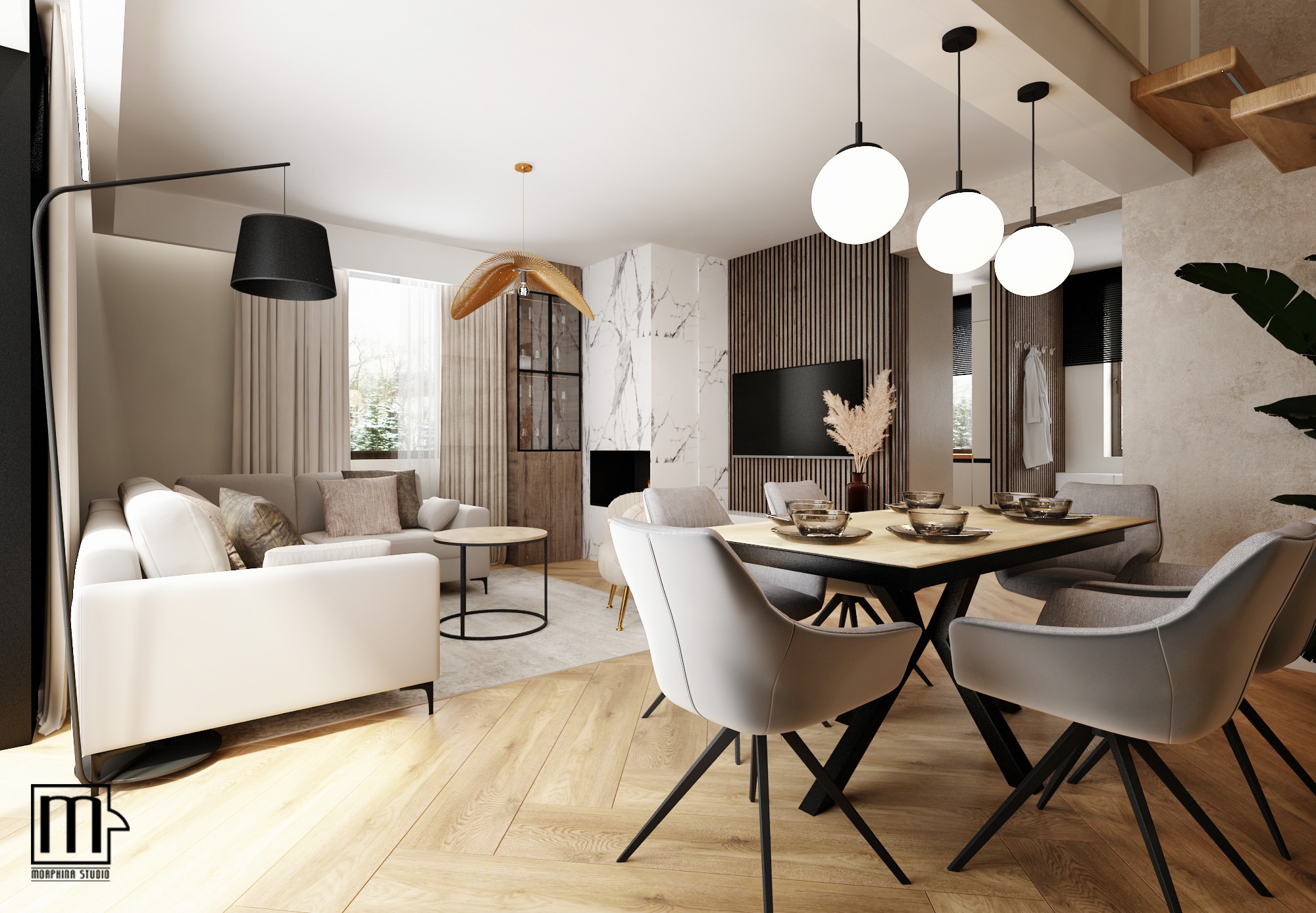Jasne wnętrze salonu z jadalnią: biała sofa, stół z szarymi krzesłami, marmurowy kominek i designerskie lampy wiszące.