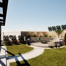 DREAMS DESIGN STUDIO - Wizualizacja ogrodu z paleniskiem otoczonym betonową ławką i ścieżką. Kamienny murek z roślinami w tle, nowoczesny budynek z dużymi oknami po lewej.