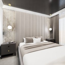 DREAMS DESIGN STUDIO - Nowoczesna sypialnia z tapicerowanym zagłówkiem, marmurową ścianą i minimalistycznymi lampami. Ciemne szafki nocne i jasna pościel. Elegancki wystrój wnętrza.