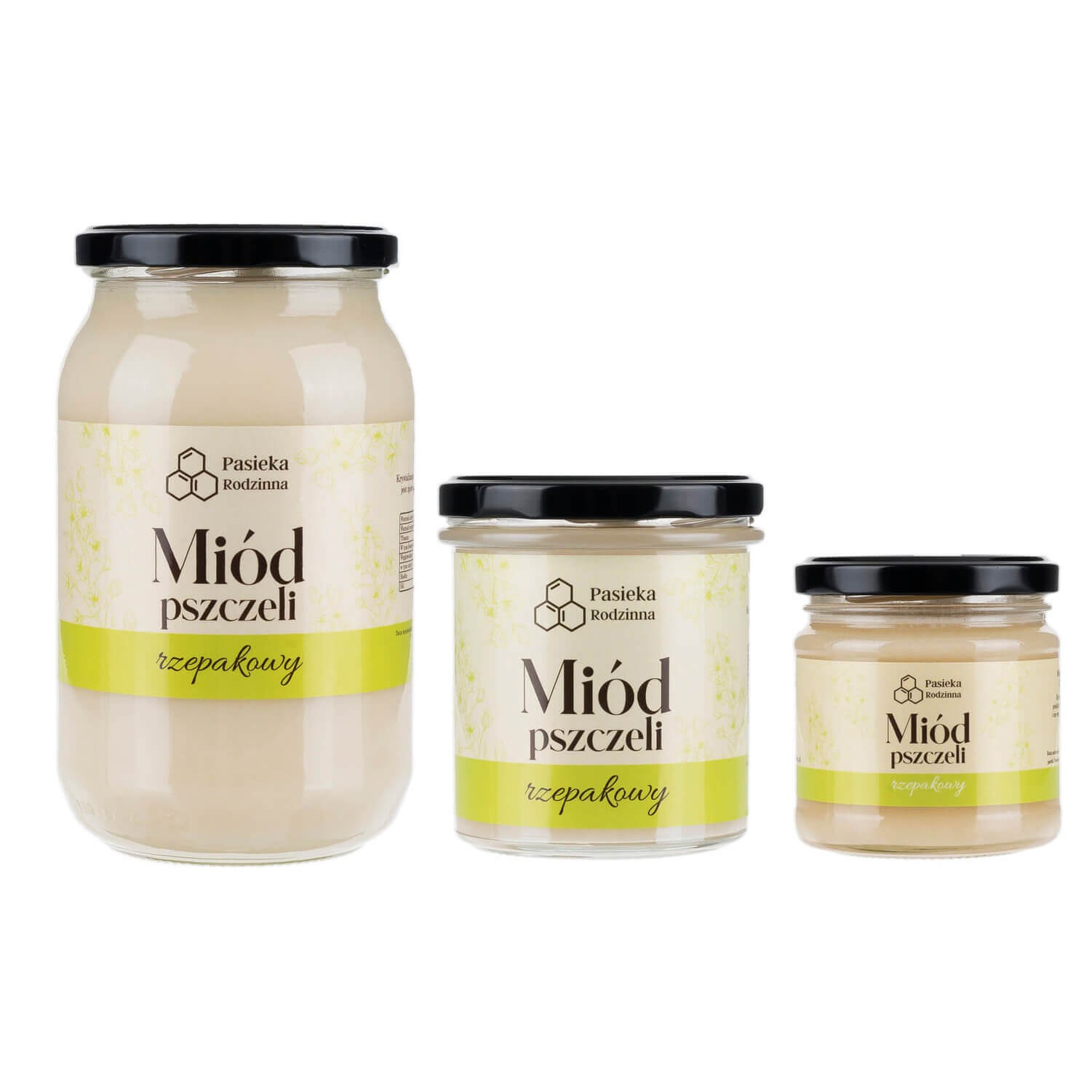 Trzy słoiki z miodem rzepakowym o różnej pojemności, każdy z czarną zakrętką i etykietą z logo 'Pasieka Rodzinna' na jasnym tle.