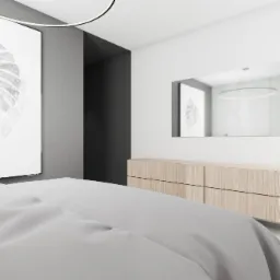 Minimalistyczna sypialnia z szarą pościelą, plakatem z motywem liścia monstery i drewnianą komodą, odbicie pokoju w lustrze.