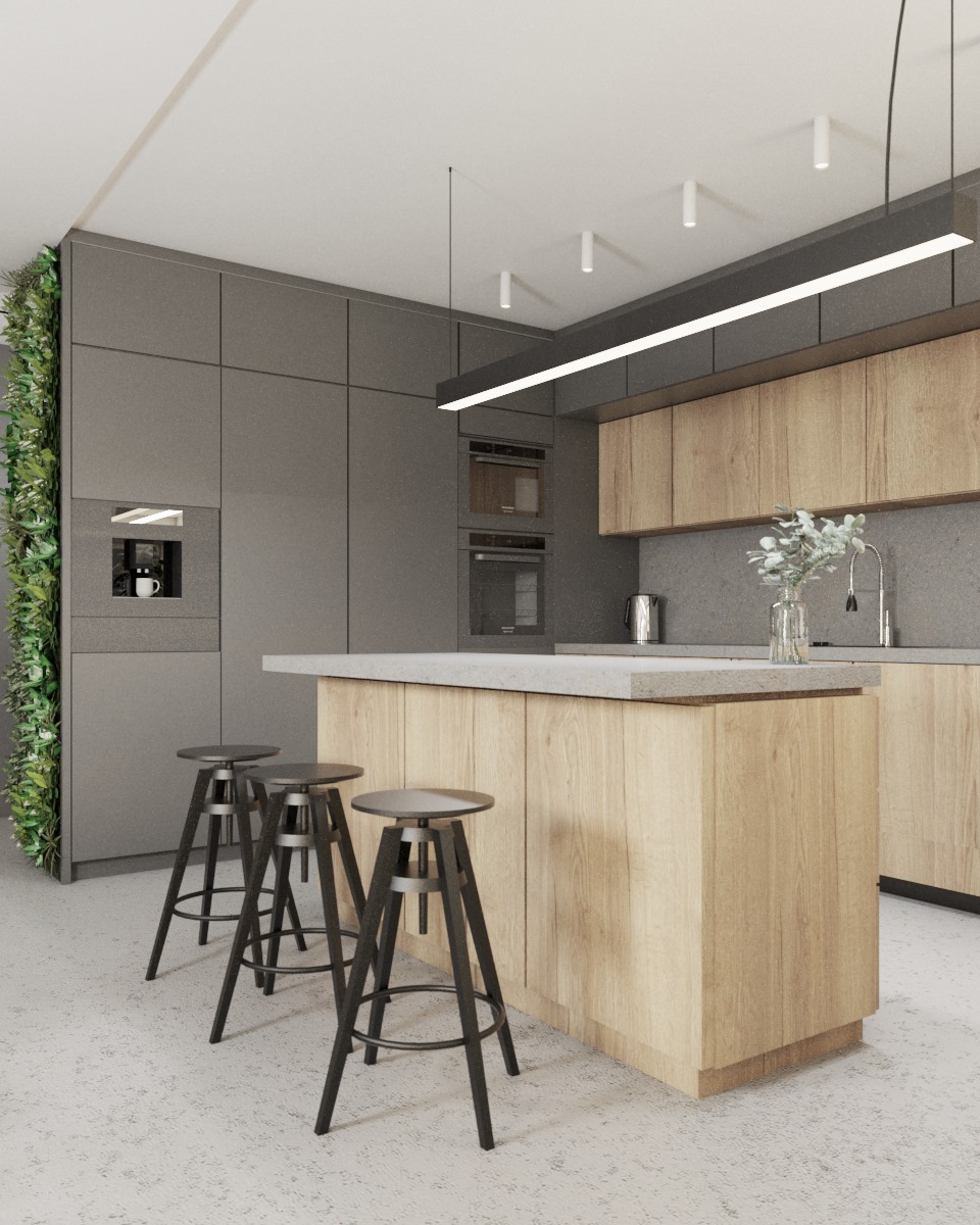 Nowoczesna kuchnia z wyspą wykończoną drewnopodobnym dekorem, szarymi szafkami, pionową zieloną ścianą i trzema metalowymi stołkami barowymi.