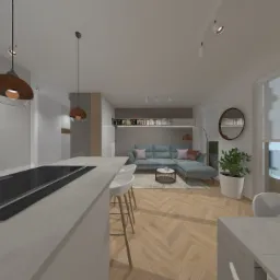 Wnętrze otwartego salonu z kuchnią w Bielsko-Białej. Widoczny narożnik w odcieniach szarości, drewniana podłoga w jodełkę, wyspa kuchenna z hokerami oraz wiszące lampy w stylu industrialnym.