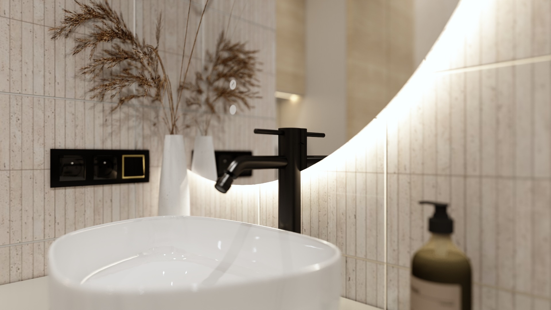 Nowoczesna łazienka z owalną umywalką, czarną armaturą i podświetlanym lustrem. Beżowe płytki imitujące kamień i dekoracyjne trawy pampasowe dodają elegancji.