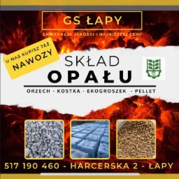 Reklama składu opału GS Łapy z ofertą orzecha, kostki, ekogroszku i pelletu, z informacją o sprzedaży nawozów i numerem telefonu.