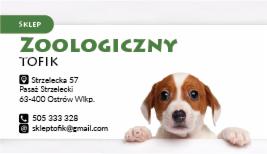 Wizytówka sklepu zoologicznego Tofik z adresem, numerem telefonu i adresem e-mail, w tle zdjęcie szczeniaka rasy Jack Russell Terrier z brązowymi uszami.