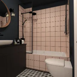 Wizualizacja łazienki z różowymi płytkami, czarną armaturą i wzorzystą podłogą. Umywalka nablatowa na ciemnej szafce, okrągłe lustro z oświetleniem. Kabina prysznicowa z czarnymi ramami nad wanną.