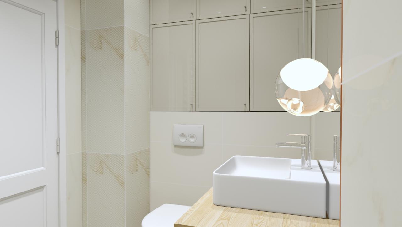 Nowoczesna łazienka w jasnych barwach z wiszącą szafką, kwadratową umywalką nablatową na drewnianym blacie i okrągłą lampą wiszącą z przezroczystego szkła.