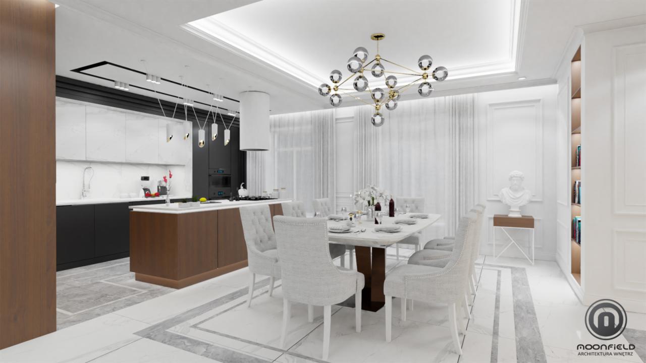 Nowoczesna aranżacja wnętrza łącząca kuchnię z jadalnią, z wyspą kuchenną o drewnianym wykończeniu, marmurowym blatem i białymi szafkami, nad którą zwisają minimalistyczne lampy. W jadalni duży...
