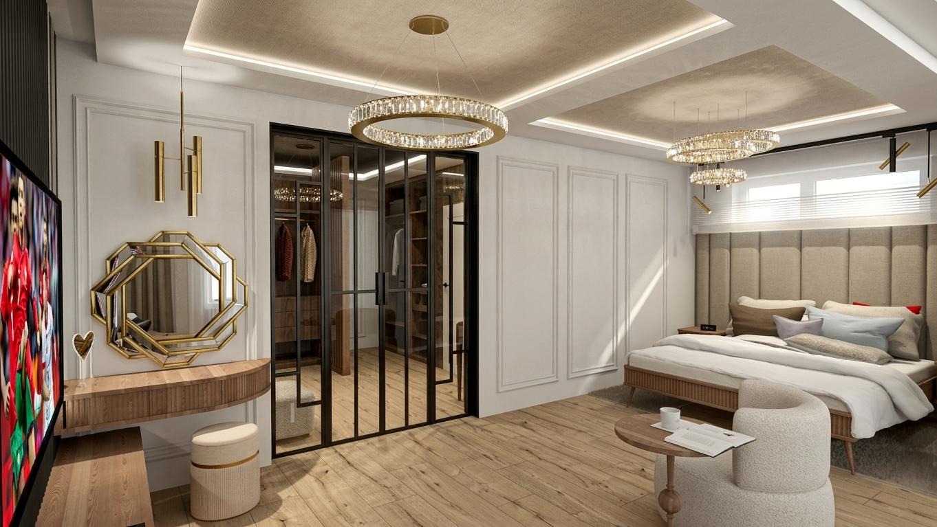 Elegancka sypialnia z garderobą za szklanymi drzwiami. Okrągłe, kryształowe lampy, toaletka z lustrem w złotej ramie i beżowe wykończenia tworzą luksusowy klimat.