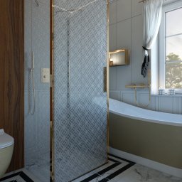 LEAN Pracownia wnętrz - Elegancka łazienka z kabiną prysznicową o wzorzystej szybie w złotej ramie, wolnostojąca wanna w odcieniach beżu, drewniana ściana z nowoczesnym panelem WC i marmurowa podłoga w czarno-białe pasy.