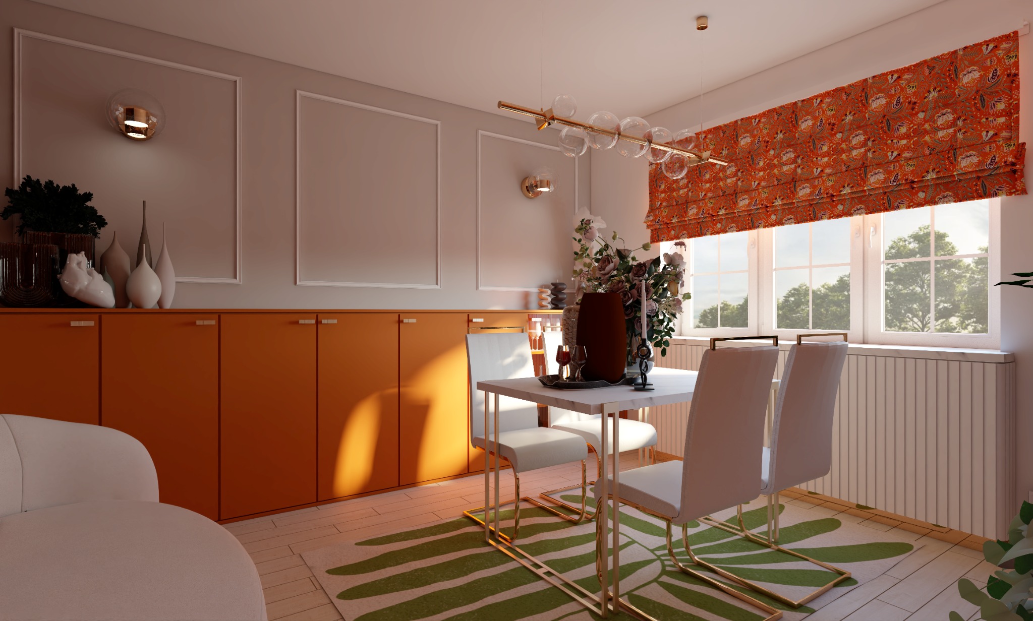 Nowoczesna jadalnia z pomarańczową zabudową meblową, białym stołem i krzesłami na złotych nogach, wzorzystą roletą rzymską i lampą sufitową z szklanych kul.