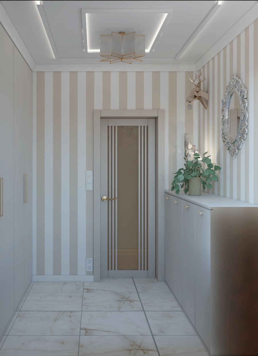 Jasne wnętrze przedpokoju w beżowo-białych pasach z lustrem w ozdobnej ramie, geometryczną dekoracją jelenia i rośliną w doniczce na szafce.