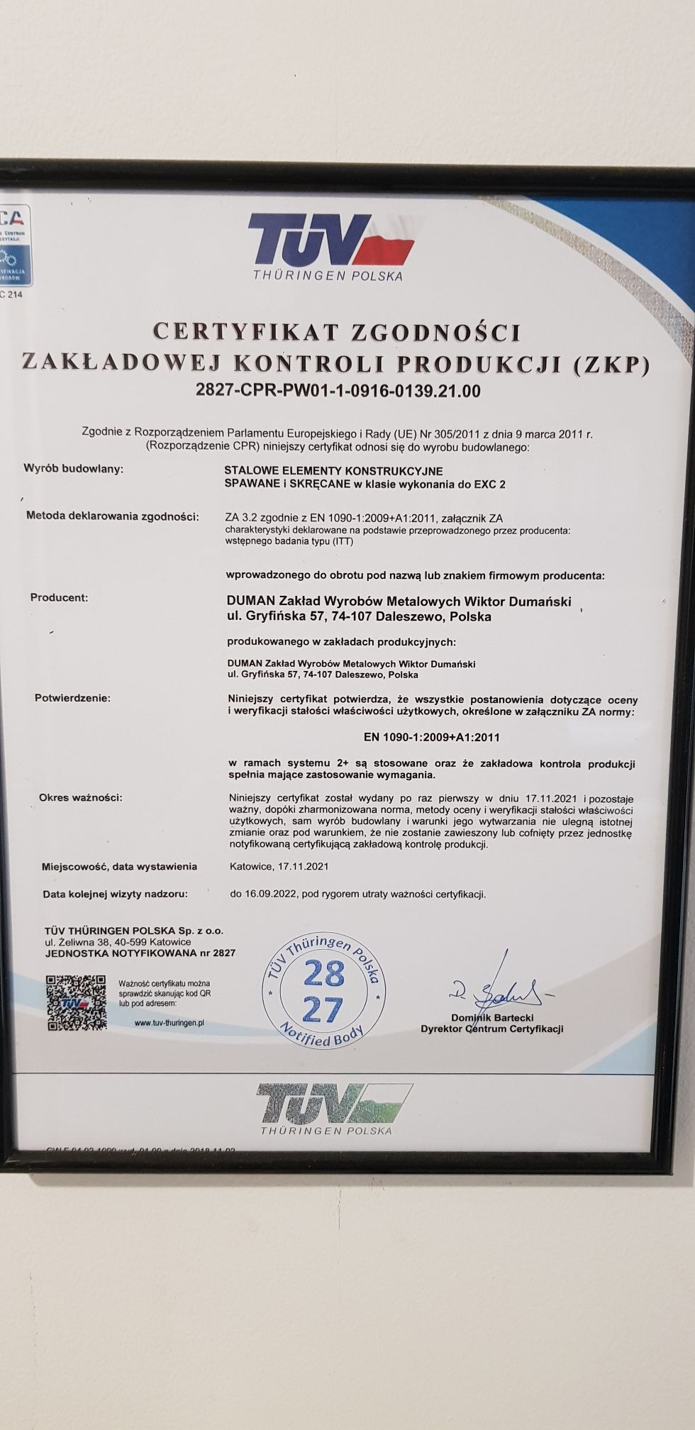Certyfikat Zgodności Zakładowej Kontroli Produkcji (ZKP) wydany przez TÜV Thüringen Polska dla firmy DUMAN Zakład Wyrobów Metalowych, potwierdzający zgodność stalowych elementów konstrukcyjnych...
