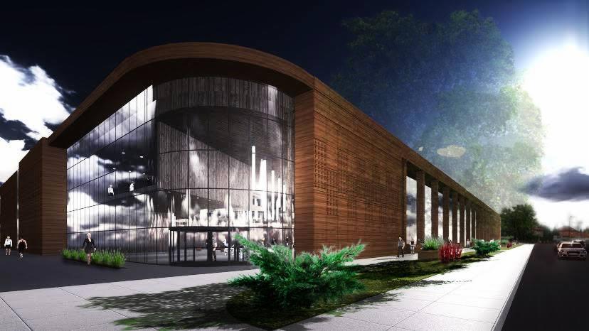 Wizualizacja budynku usługowego z drewnianą elewacją i przeszkloną fasadą, otoczonego zielenią i chodnikiem, z widocznymi sylwetkami przechodniów.
