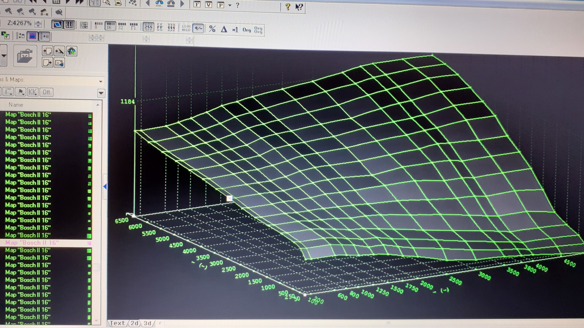 Ekran komputera przedstawiający trójwymiarowy wykres mapy silnika Bosch II 16, z zieloną siatką na czarnym tle, widoczne menu i ikony programu.