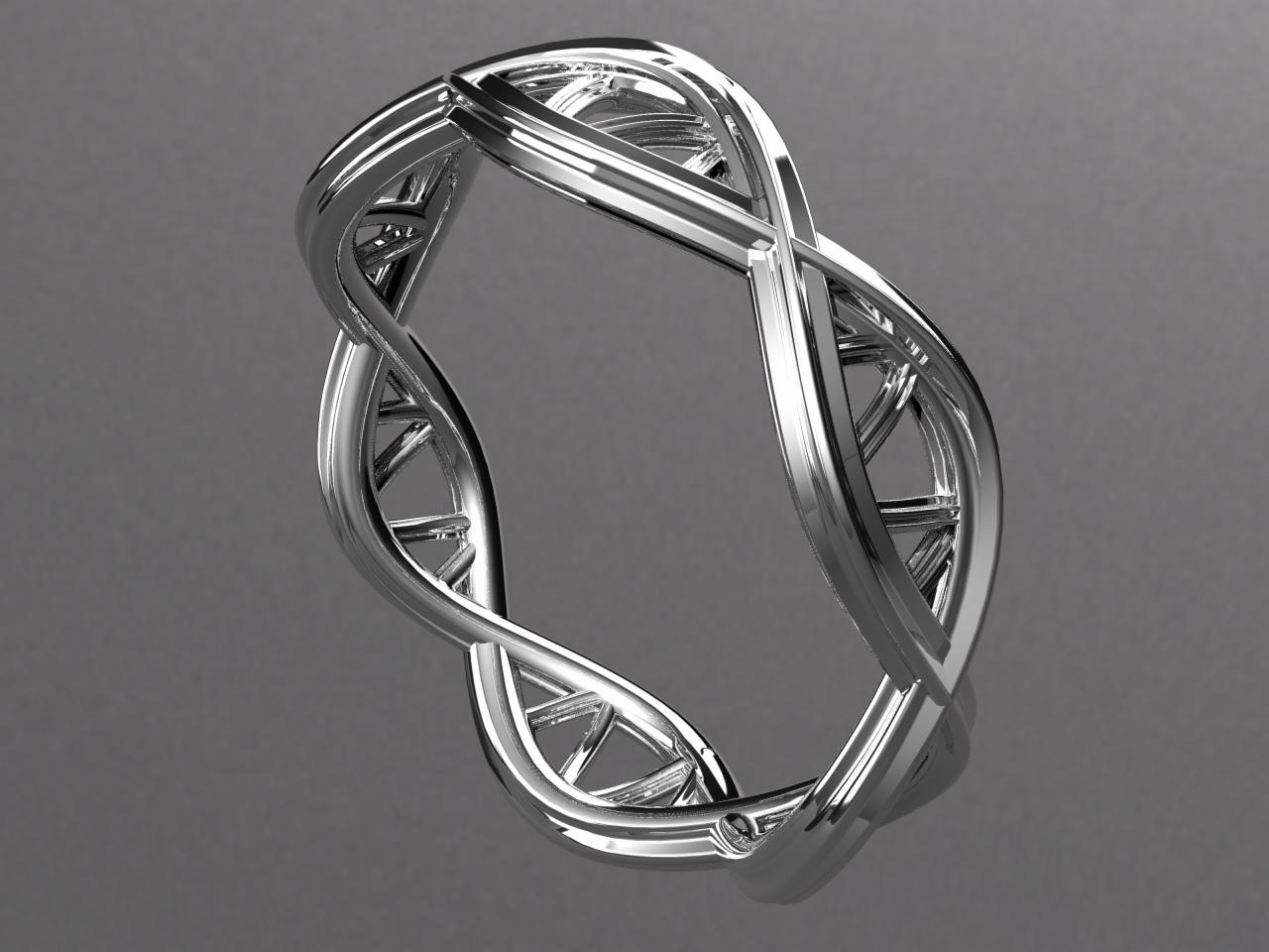 Srebrny pierścionek o kształcie podwójnej helisy DNA, prezentowany na gładkim, szarym tle. Metal polerowany na wysoki połysk, ukazujący detale struktury molekularnej.